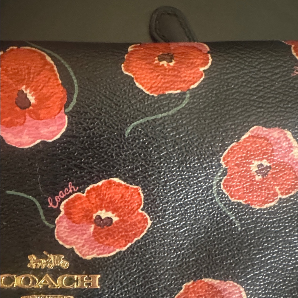 COACH bifold wallet with cute poppy print. Change pocket in back. Snap closure. - Picture 6 of 16